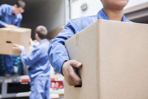Office relocation planning in Hammersmith with desks and moving crates