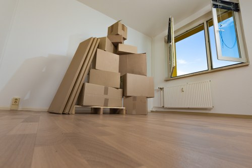 Household furniture and boxes prepared for transport in West London
