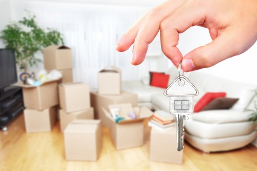 Professional piano movers loading an instrument for delivery across West London