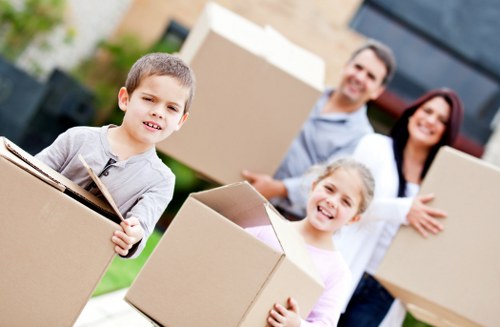 Boxes and furniture being loaded for a student move in West London