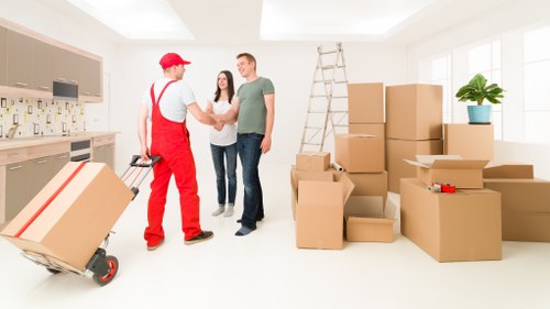 Removal crew loading business furniture for an office move