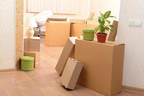 Packed household boxes and furniture prepared for a Hammersmith relocation