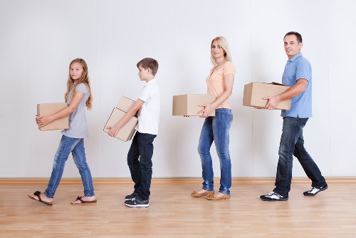 Wardrobe boxes, bubble wrap, and packing materials for a local move