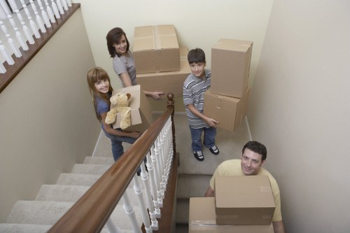 Removal truck with moving boxes and household items ready for collection